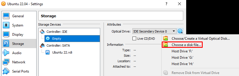 Fenêtre VirtualBox montrant comment monter un fichier ISO sur un lecteur de DVD
